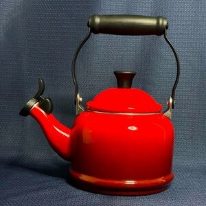 Red Le Creuset tea kettle